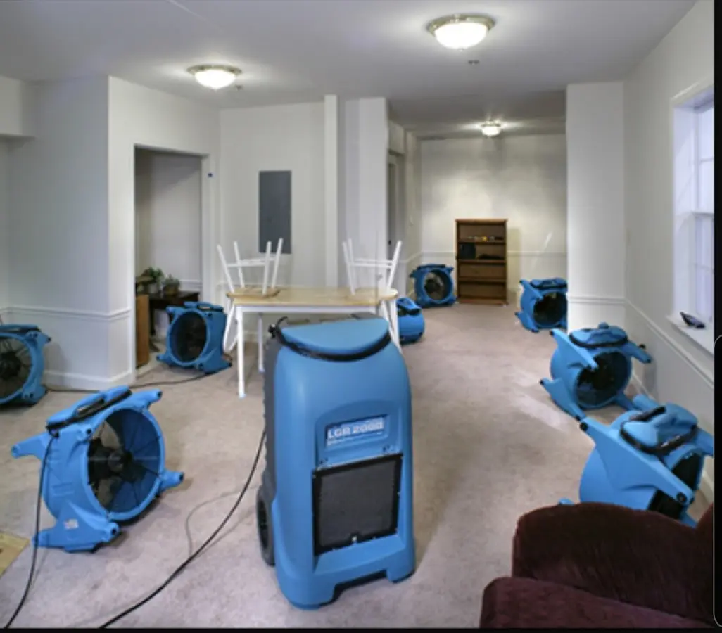 Air movers and dehumidifier setup for Water Extraction & Removal in Lander